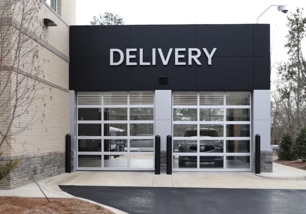 A designated delivery area for new Kia vehicles, showcasing a professional and seamless customer experience.